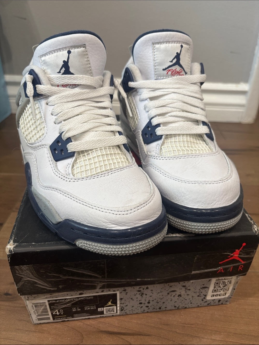Jordan Kids White and Navy Retro 4 Basketball Sneakers